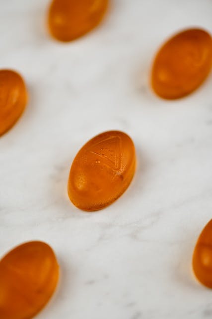 Tangerine Gummies 1:1:1 (CBG:CBD:THC) 100MG - Coast Cannabis - Image 1