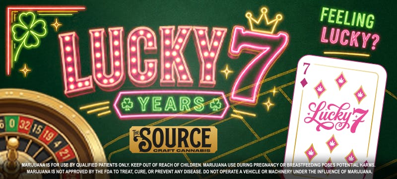 The Source Craft Cannabis casino-themed banner celebrating 7 year anniversary, 'Lucky 7 Years,' with neon marquee lettering, playing card, poker chips, roulette wheel, and dice on a green felt background.