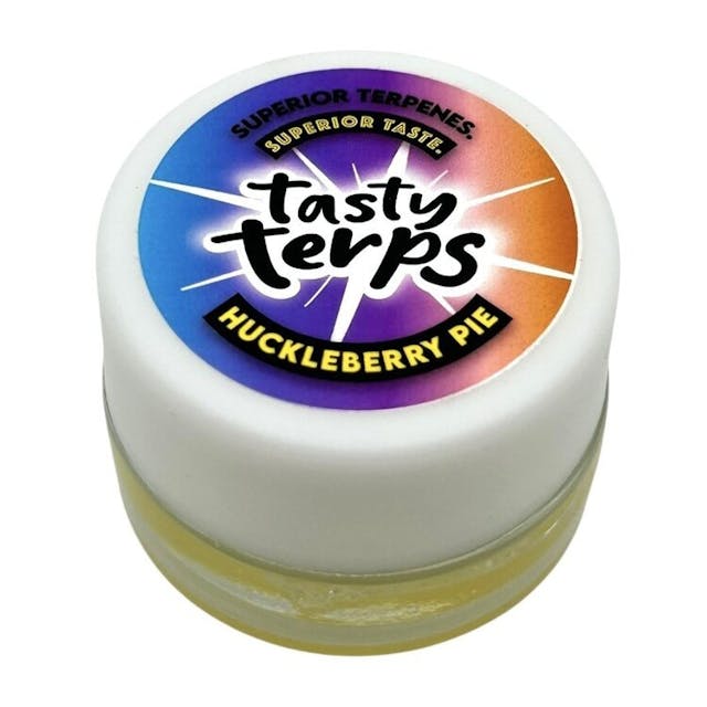 Tasty Terps sets the Gold Standard for flavored dabs, combining premium Diamond Badder with the finest, most carefully curated terpene profiles on the market. Tasty Terps spring to life on your palate, delivering a burst of flavor from initial smell to final exhale. Our full-spectrum flavored blends transfer to your taste buds with unmatched clarity. HUCKLEBERRY PIE: Indulge in the warm, comforting taste that perfectly captures the essence of this classic dessert. On the inhale sweet huckleberries are at the forefront of the palette, that's balanced by a rich, buttery crust-like undertone on the exhale. This craft flavor evokes the nostalgia of a fresh-baked pie cooling on the windowsill.